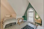 Discover Added Flexibility in the Green Suite with the Queen and Twin Beds - Ideal for Accommodating Various Group Needs